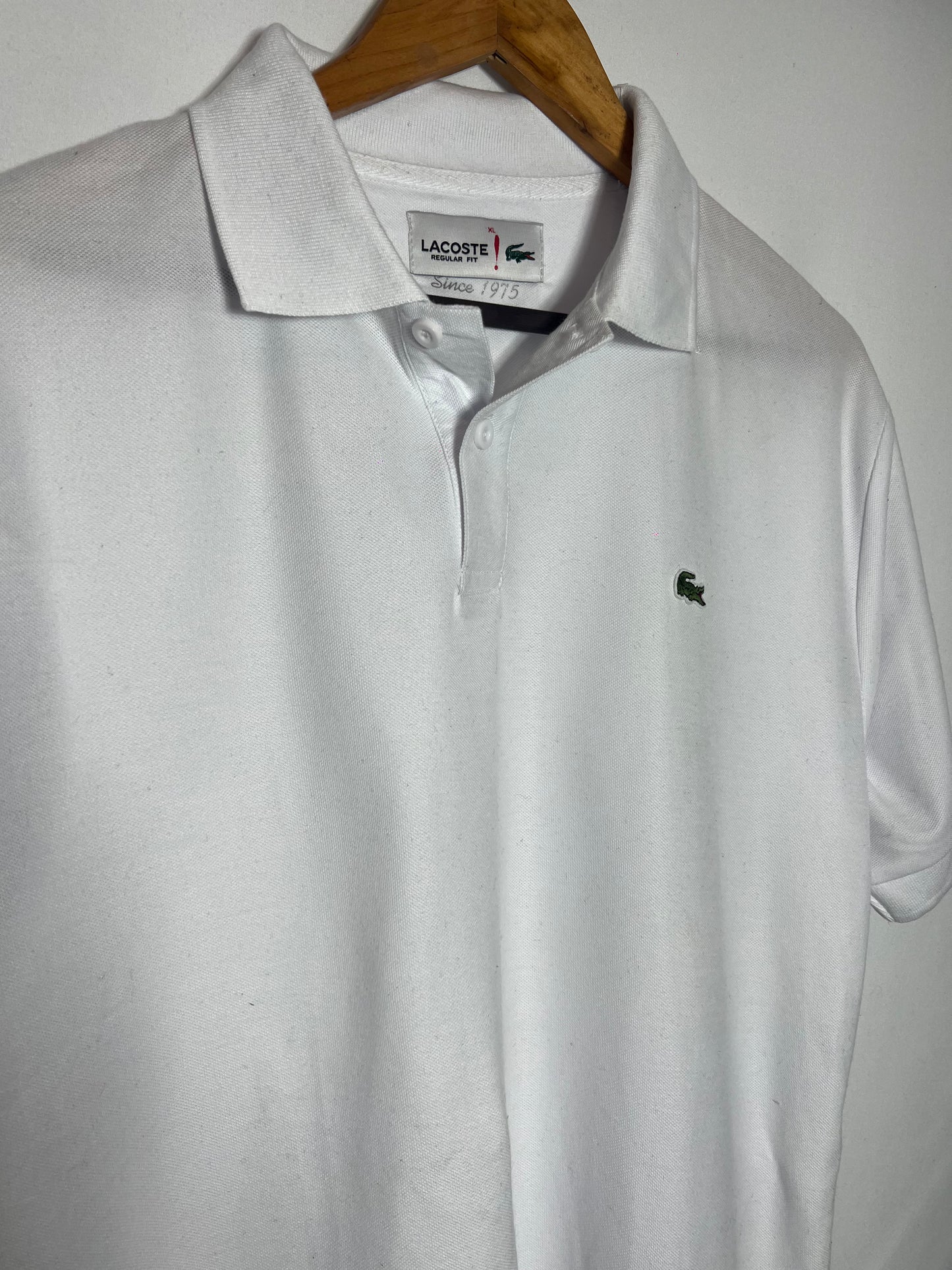Remera Polo Lacoste color blanco